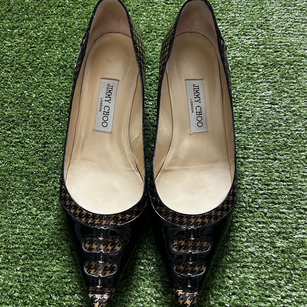 Jimmy Choo Black Heels with Pointed Toe and Metallic Accents